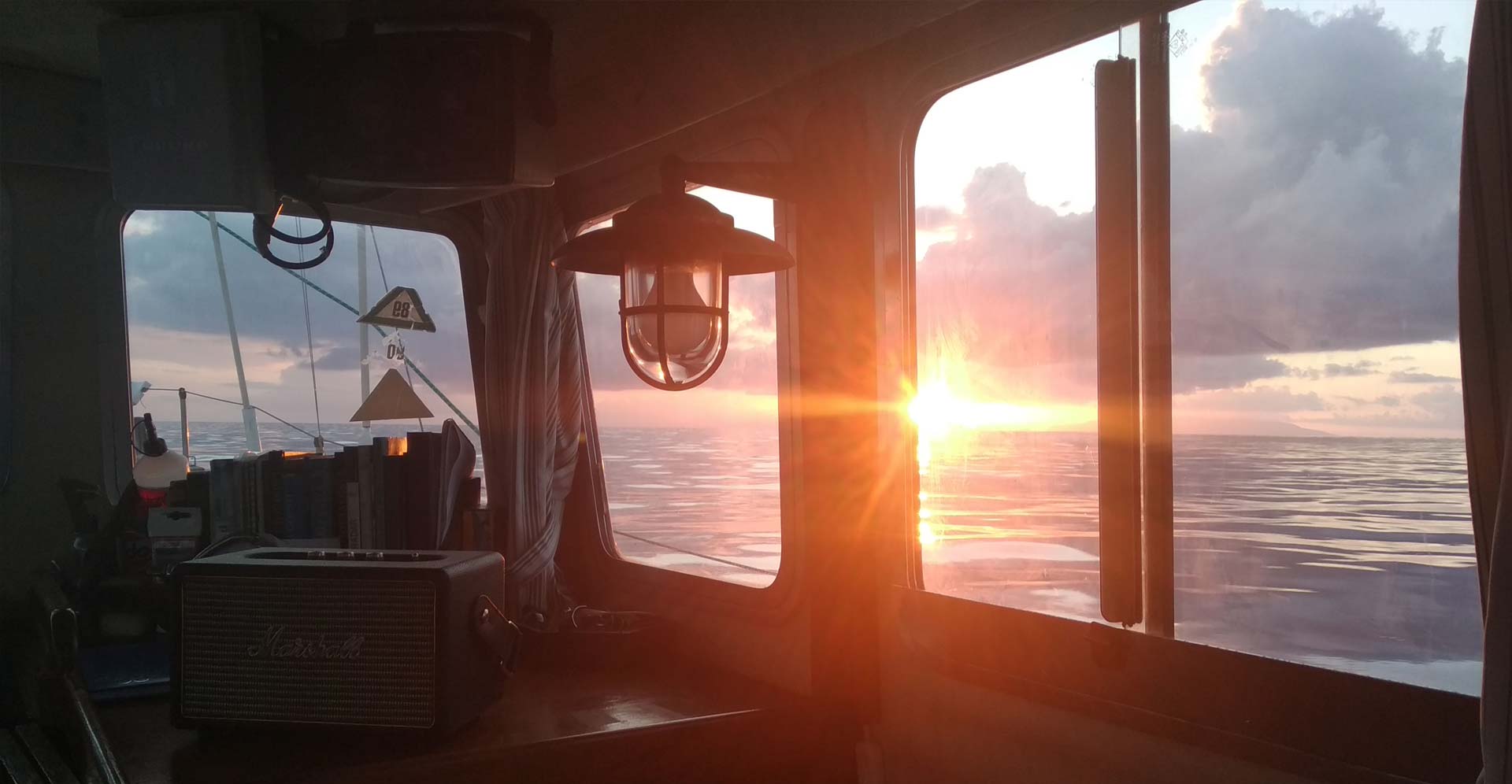 Vessel underway off Marbella — aerial, wide